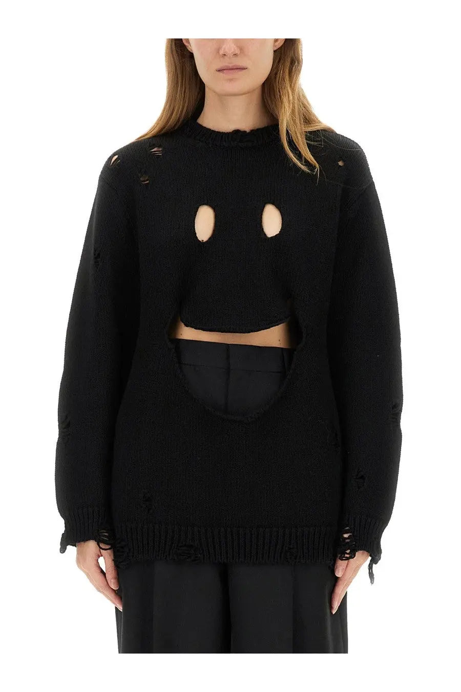 Moschino women’s black wool jersey sweater with knitted distressed ripped details and face-like cutout design