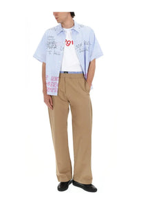 Msgm men’s camicia con stampa blue light blue and white striped short-sleeved shirt with red graffiti lettering
