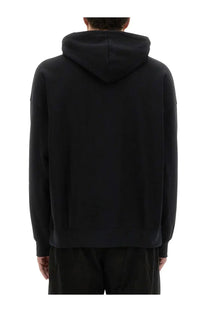 Msgm men’s black hooded sweatshirt with minimalist design and ribbed cuffs in cotton fabric
