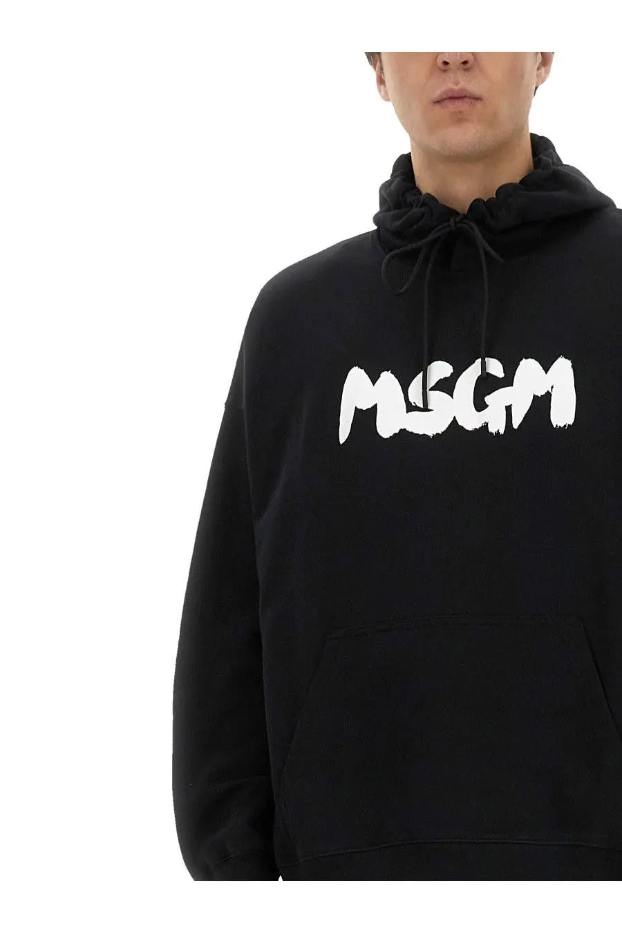 Black oversized MSGM men’s hoodie with white brush stroke logo on chest made from comfortable material
