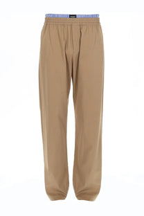 Beige cotton msgm men’s trousers with blue and white striped elastic waistband and double elastic detail