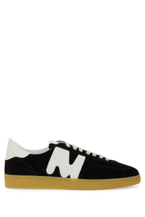 Black suede low-top MSGM men’s retro sneaker with bold white n logo tan rubber sole and white laces