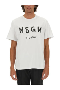 White MSGM Milano cotton t-shirt featuring bold black brushstroke lettering on the front