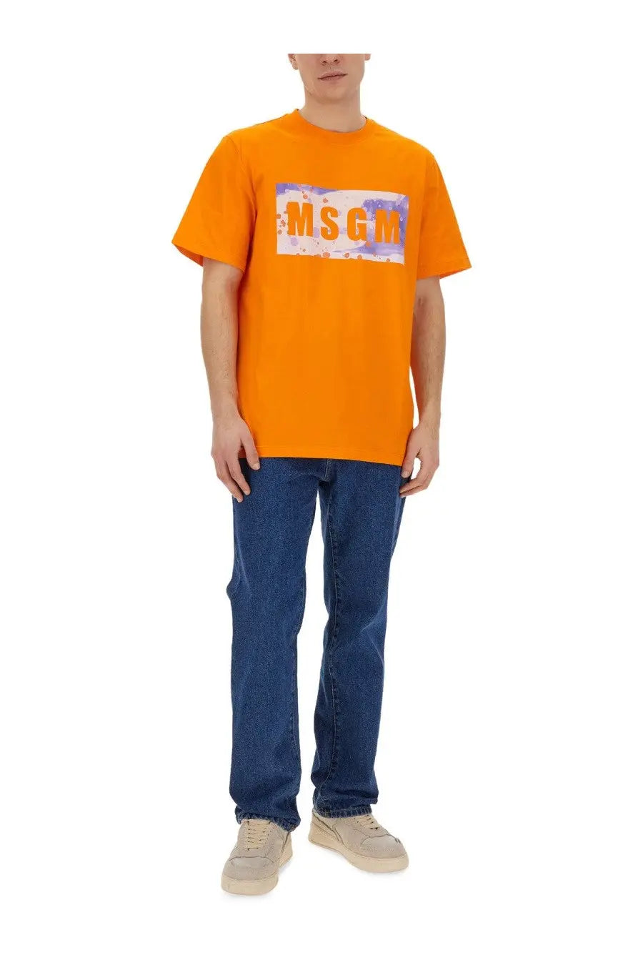 Bright orange MSGM men’s t-shirt with rectangular blue and white splattered logo graphic on front