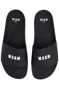 Black msgm milano slide sandals with bold white logo branding for men in a comfortable slip-on design
