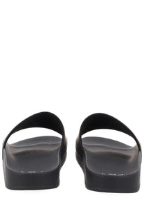 Msgm men’s slide con black rubber slide sandals with a thick chunky sole and simple strap design