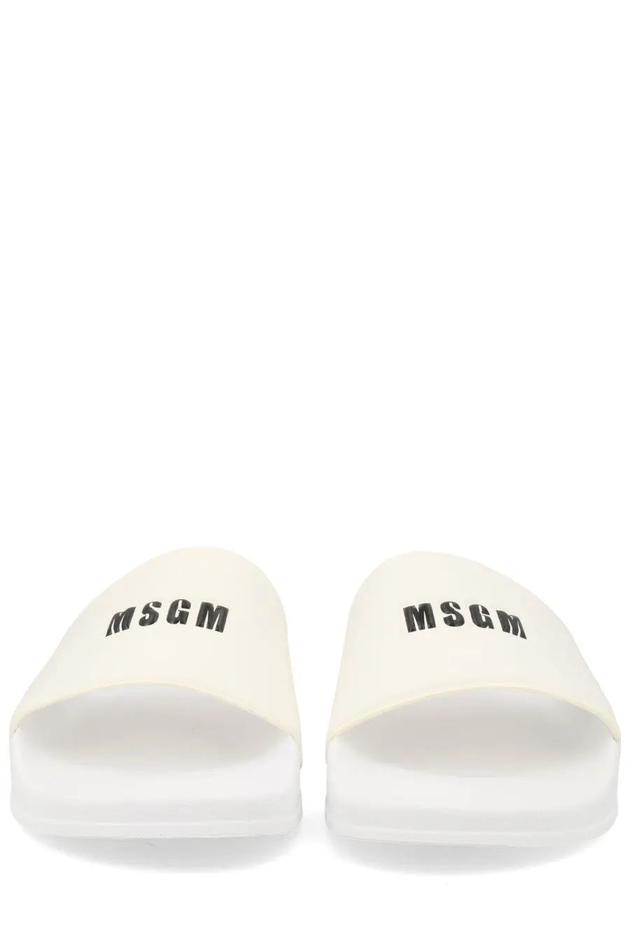 Cream-colored MSGM men’s slide sandals with black logo branding ideal for casual summer wear