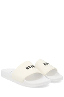 Cream-colored MSGM men’s slide sandals with black mschf branding on the strap for casual wear