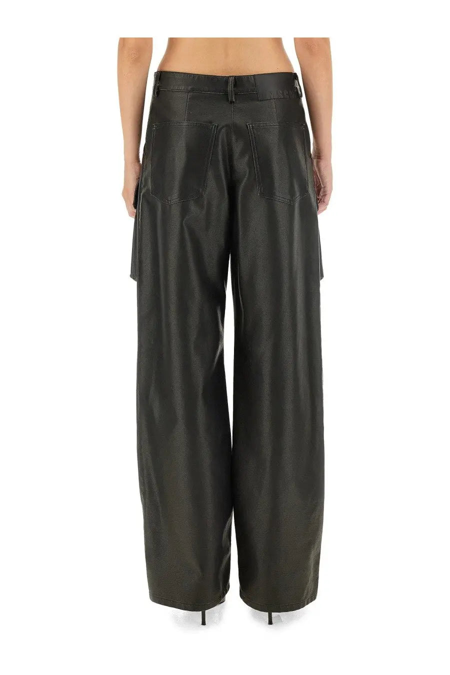 Msgm women’s black faux leather cargo pants with wide legs and prominent side pockets in a sleek modern design