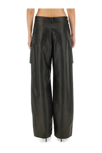 Msgm women’s black faux leather cargo pants with wide legs and prominent side pockets in a sleek modern design