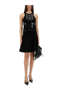 Msgm women’s black cotton sleeveless dress with fitted bodice featuring circular cutouts and flared skirt
