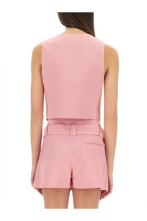 Msgm women’s sleeveless pink cropped top with matching belt and flared shorts set for casual wear