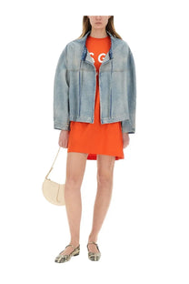 Msgm women’s light-wash denim jacket in blue with frayed collar and front zipper closure