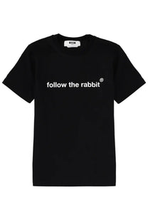 Black MSGM women’s t-shirt with white follow the rabbit text across the chest made of soft cotton material