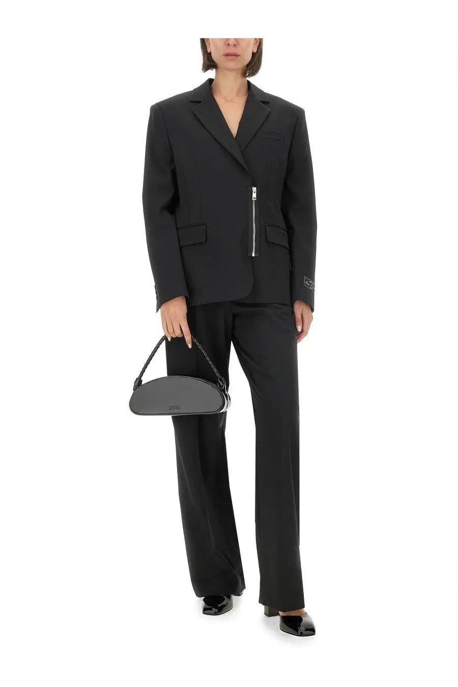 Black leather handbag with curved minimalist design and chain strap featured with msgm women’s black jacket