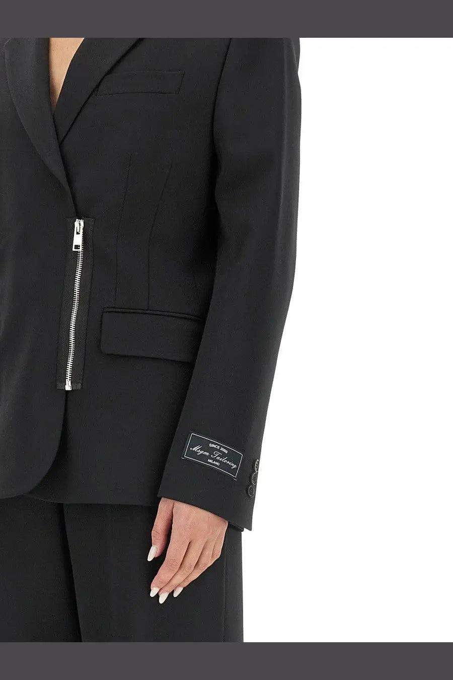 Msgm women’s black tailored blazer with silver side seam zipper and branded label at the cuff