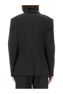 Msgm women’s black tailored blazer with structured shoulders and central seam perfect for formal wear