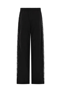 Msgm women’s black wide-leg trousers with shimmering silver sequin side panels and lace details