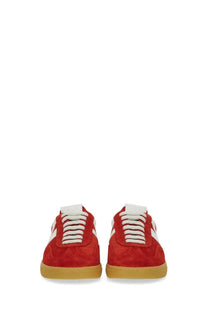 Msgm women’s retro sneaker red featuring red suede with white laces and side stripes and tan rubber sole