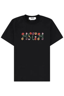 Black MSGM women’s t-shirt featuring colorful floral appliqué embroidery on the front with brand name design