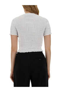 Msgm women’s white smocked short-sleeved crop top with ruffled hem and textured fabric