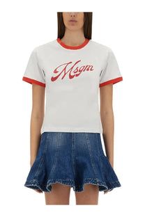 Msgm women’s white t-shirt with red cuffed sleeves and collar featuring a bold red script logo across the chest