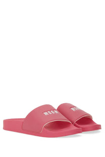Pink rubber slide sandals with white msgm logo on the strap for women
