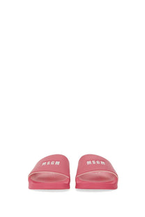 Msgm women’s slide sandal pink with white logo branding on pink synthetic material upper strap