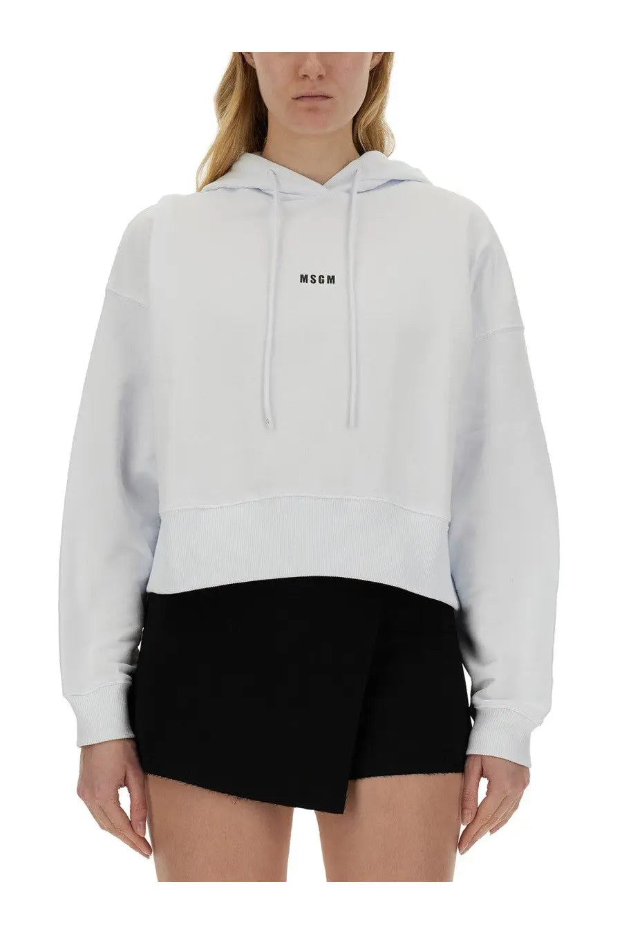 White cropped hoodie with black msgm logo on chest and ribbed hem in msgm women’s sweatshirt white