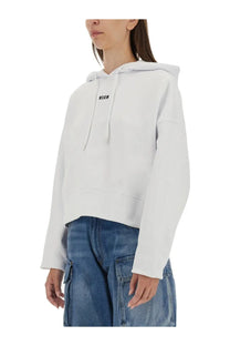 White cropped hoodie with black mschf logo on the chest from MSGM women’s sweatshirt collection