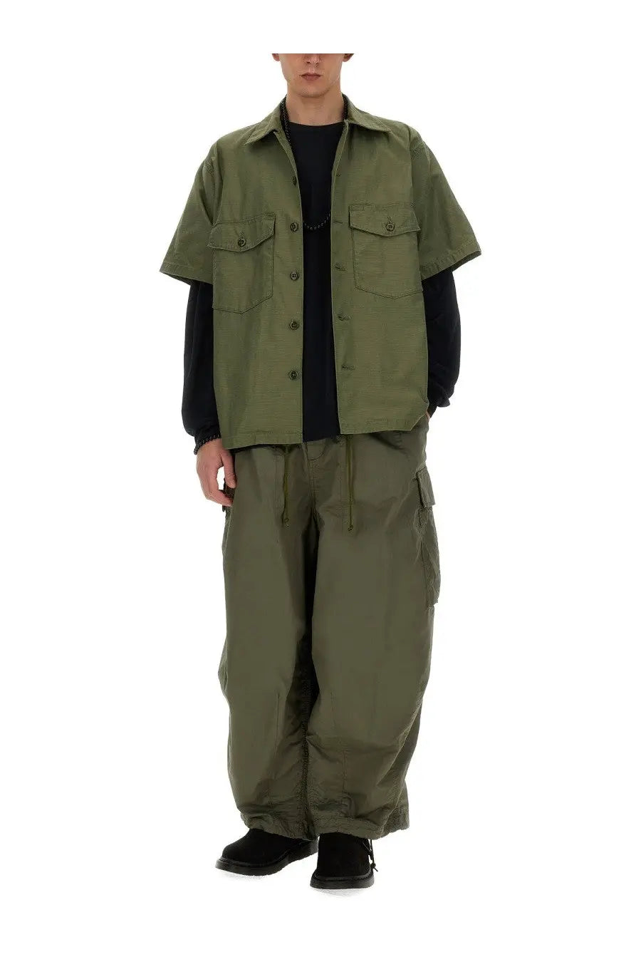 Olive green short-sleeved utility cotton shirt with two chest pockets and button closures by Needles men