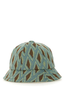 A needles men’s bucket hat with a bold geometric pattern in blue brown and green shades