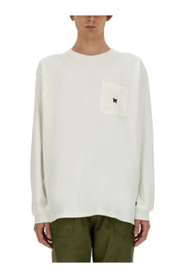 Needles men’s white long-sleeved crewneck sweatshirt with small chest pocket and embroidered butterfly logo