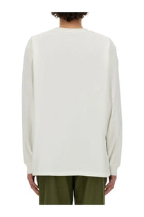 Needles men’s off-white long-sleeved shirt with a relaxed fit and subtle ribbed cuffs in minimalist style