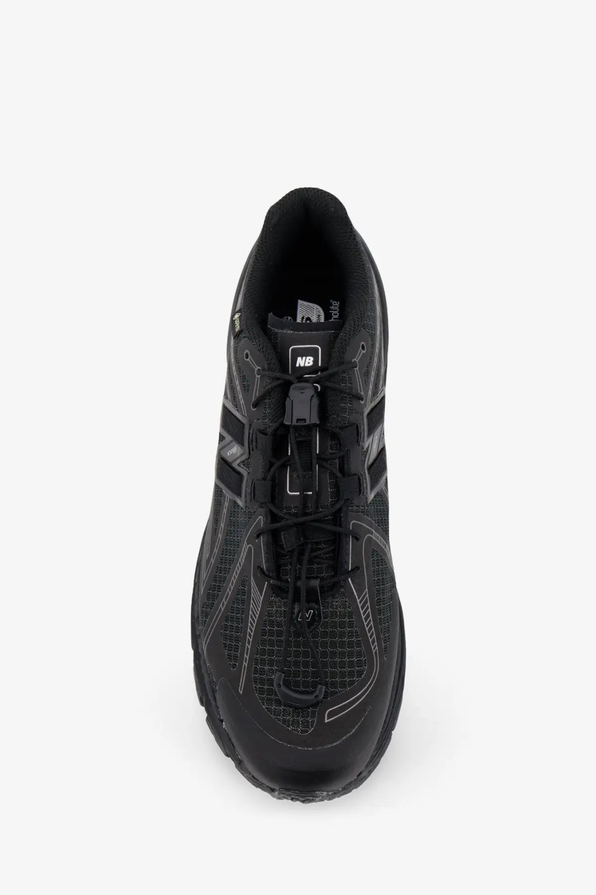 New Balance men’s Gore Tex black running shoe with mesh upper and rubber outsole for outdoor use