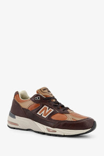 New Balance men’s leather sneakers brown with textured leather panels mesh overlays and white midsole