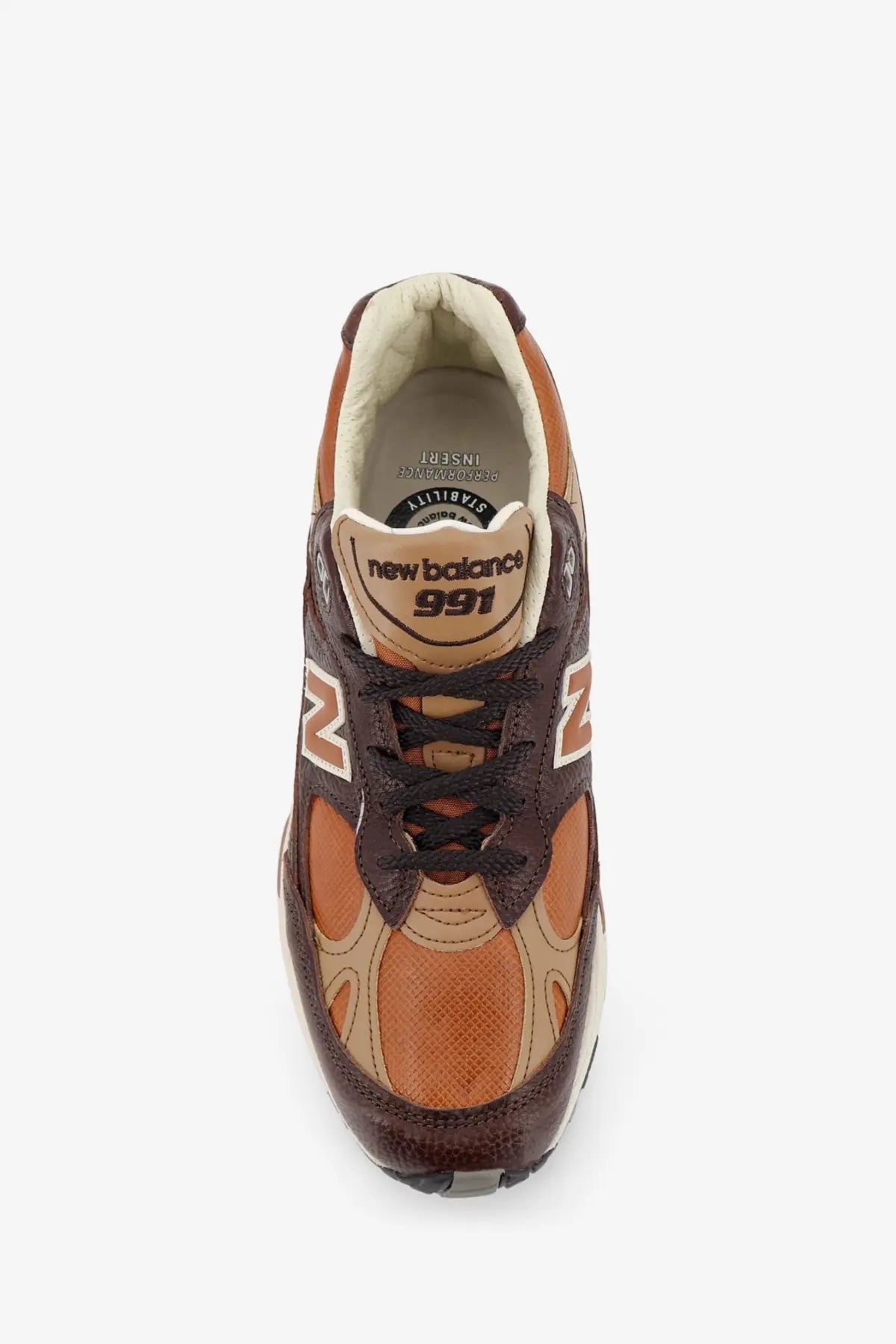 New balance men’s leather sneakers brown with textured leather upper mesh panels and contrasting stitching