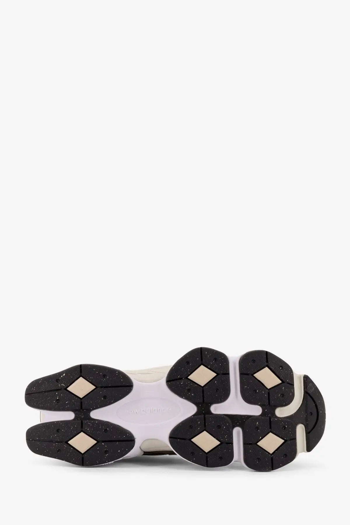 New balance men’s low top mesh sneakers beige with white and black chunky sole featuring diamond shaped rubber grips