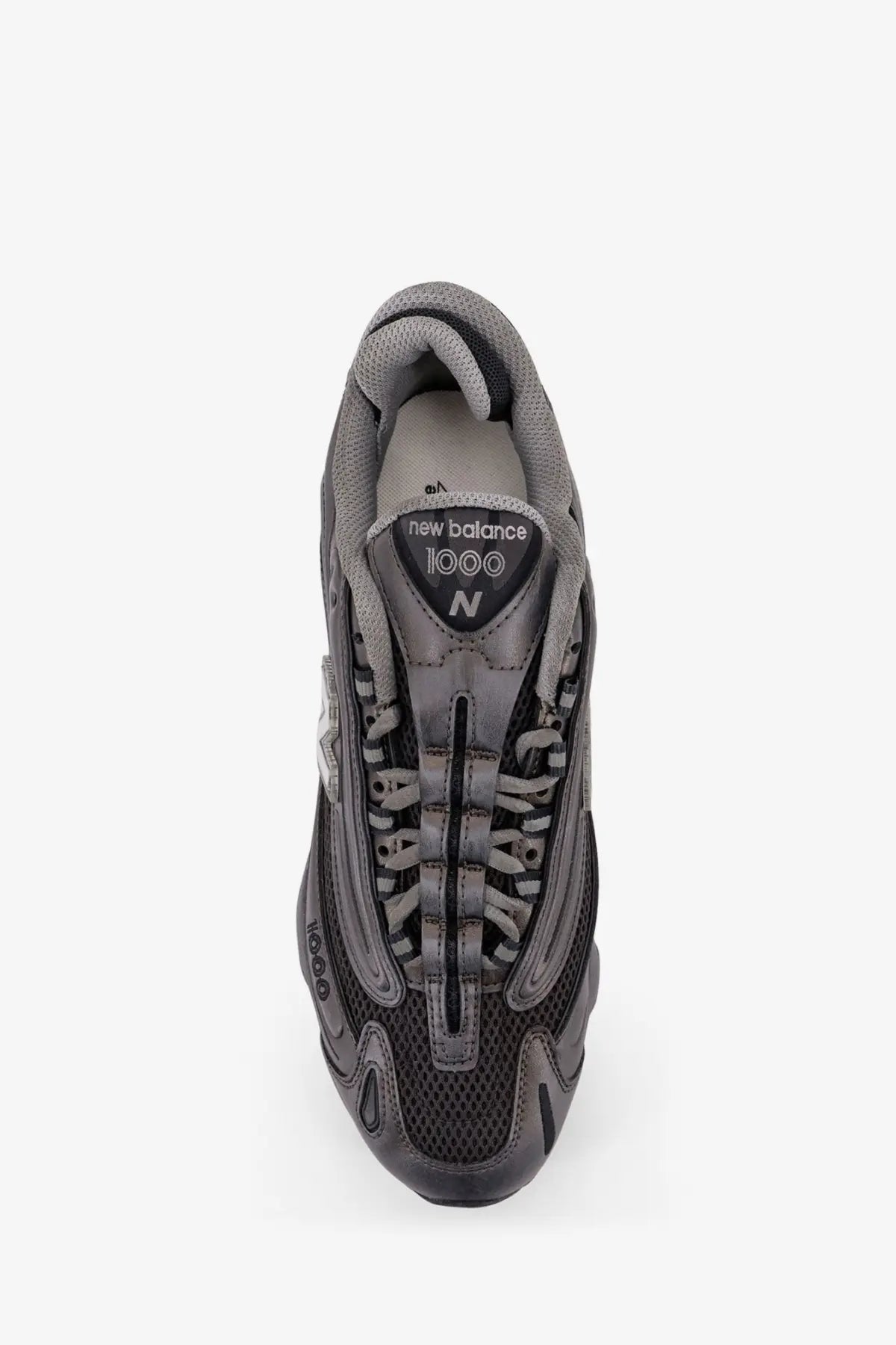 New Balance men’s low top mesh sneakers in gray with synthetic overlays for lightweight comfort and style