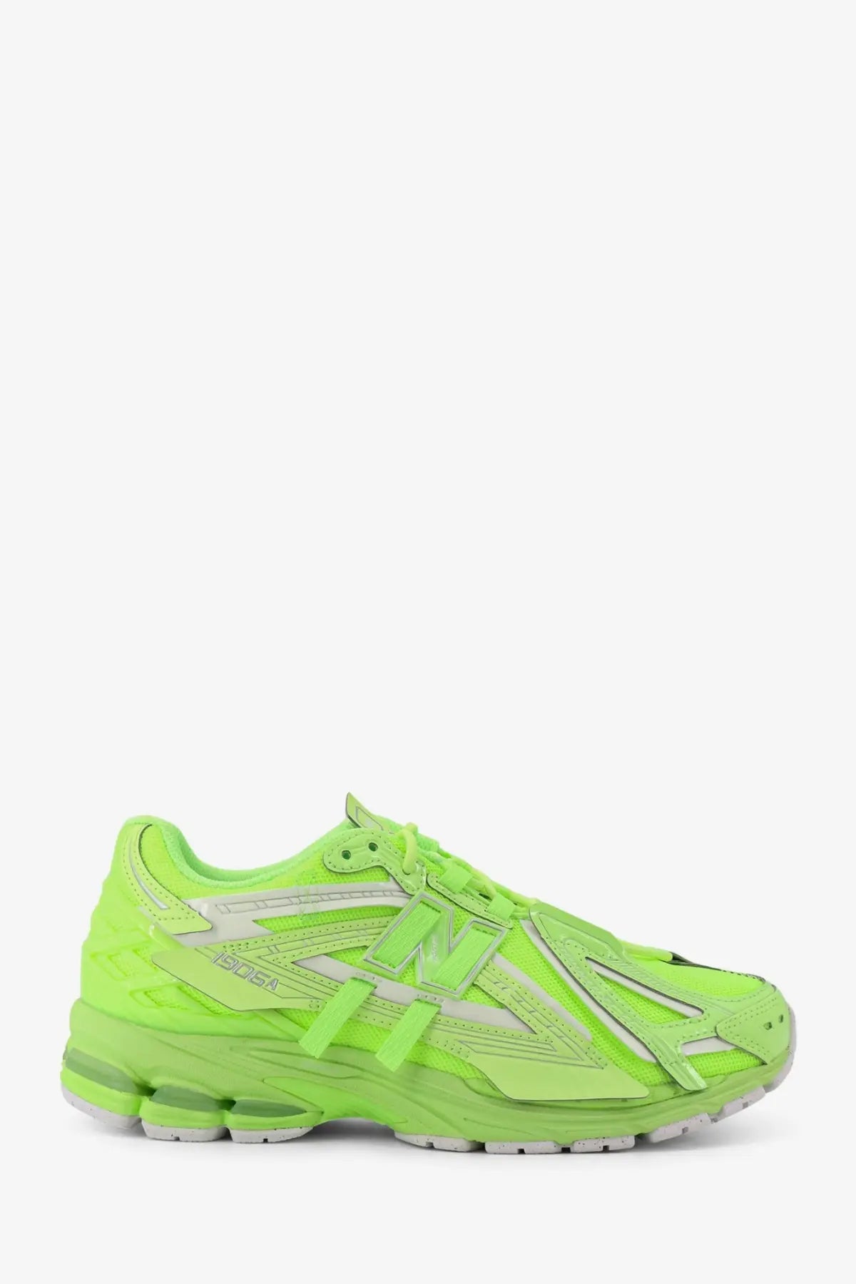 New balance men’s low top mesh sneakers green with vibrant neon green color silver accents and chunky sole