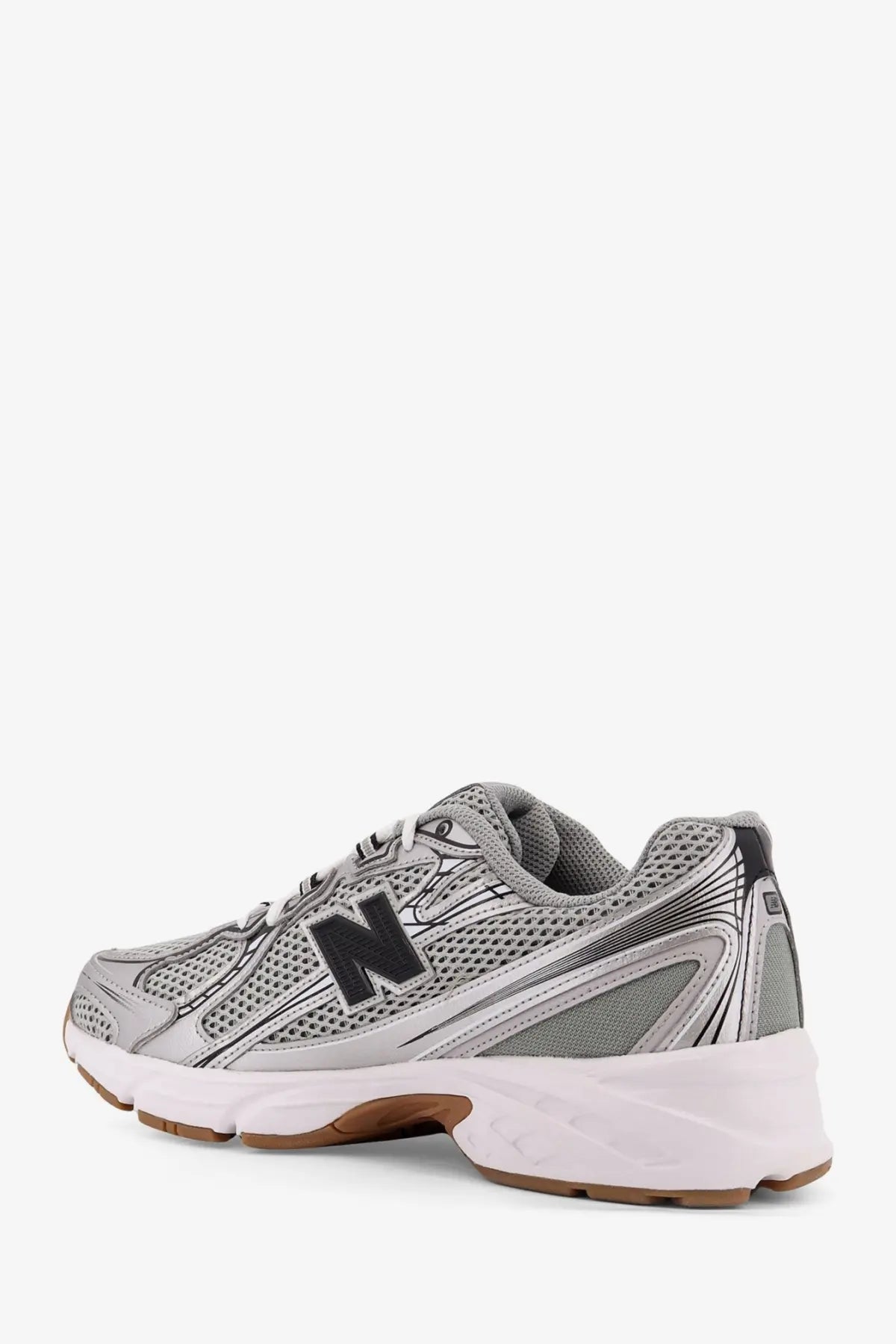 New Balance men’s low top mesh sneakers in silver and black with mesh upper, white midsole, and brown outsole