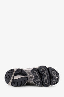 New balance men’s low top mesh sneaker sole in black and gray with textured cushioned design for comfort