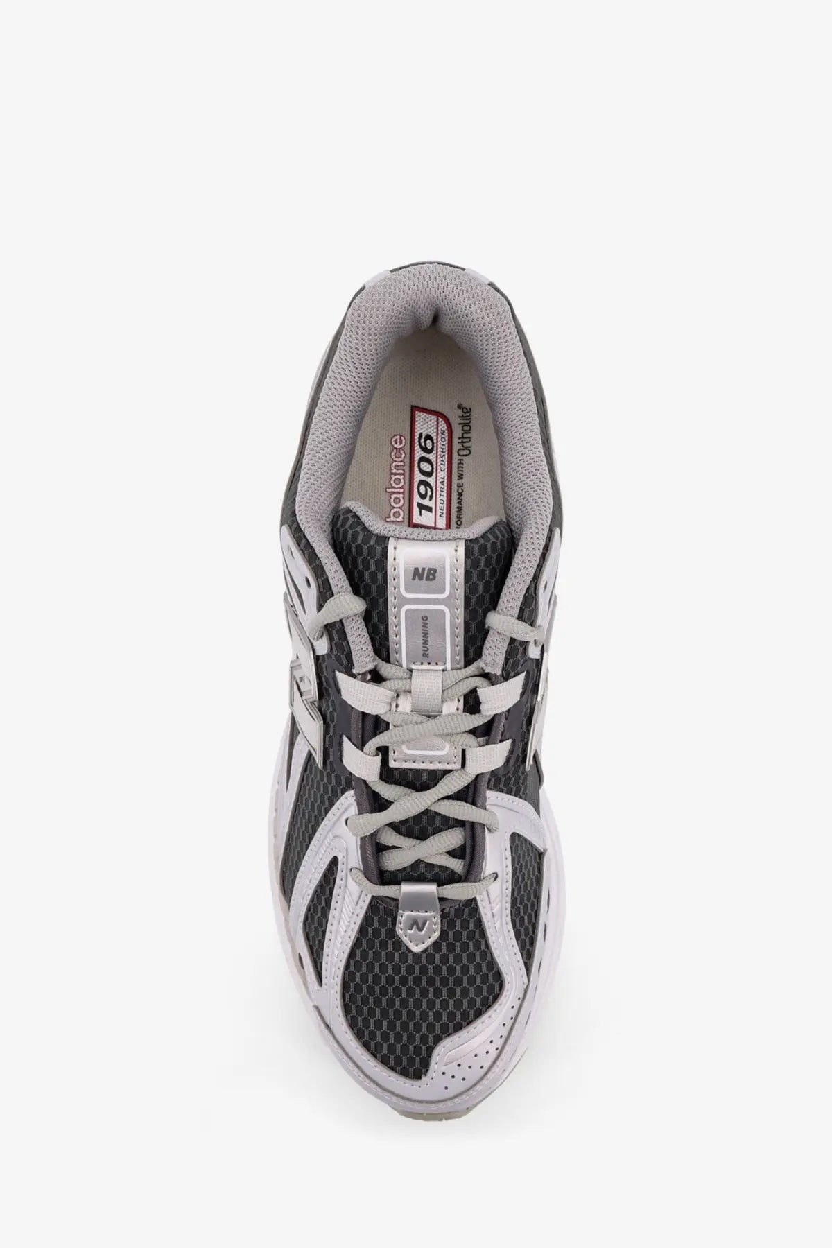 New balance men’s low top mesh sneakers in gray and black with white laces and silver accents on the upper