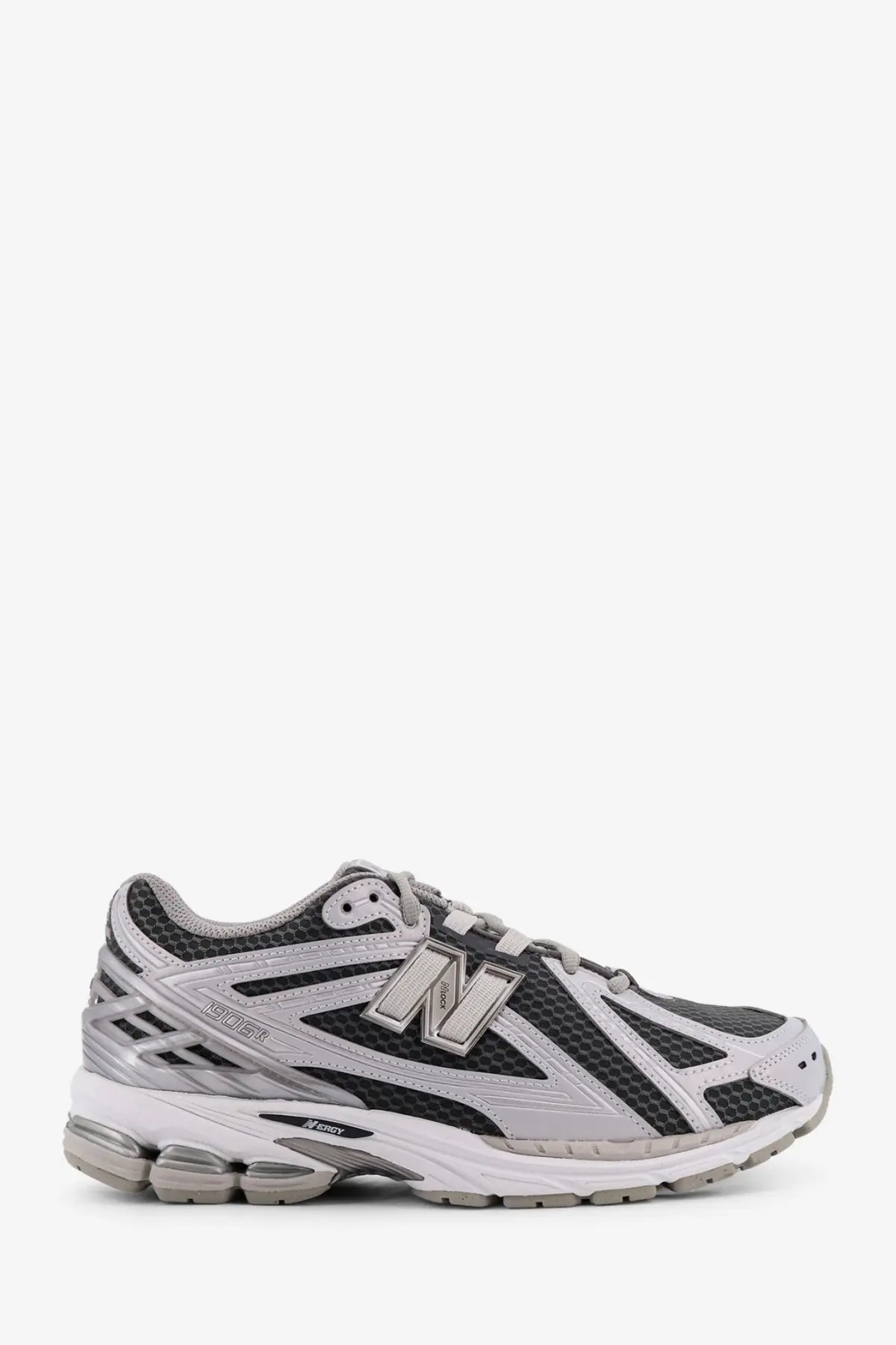 New balance men’s low top mesh sneakers in gray and black with metallic silver logo and cushioned midsole