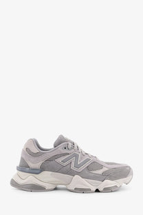 New balance men’s low top gray sneakers with mesh and suede upper and chunky white and gray sole