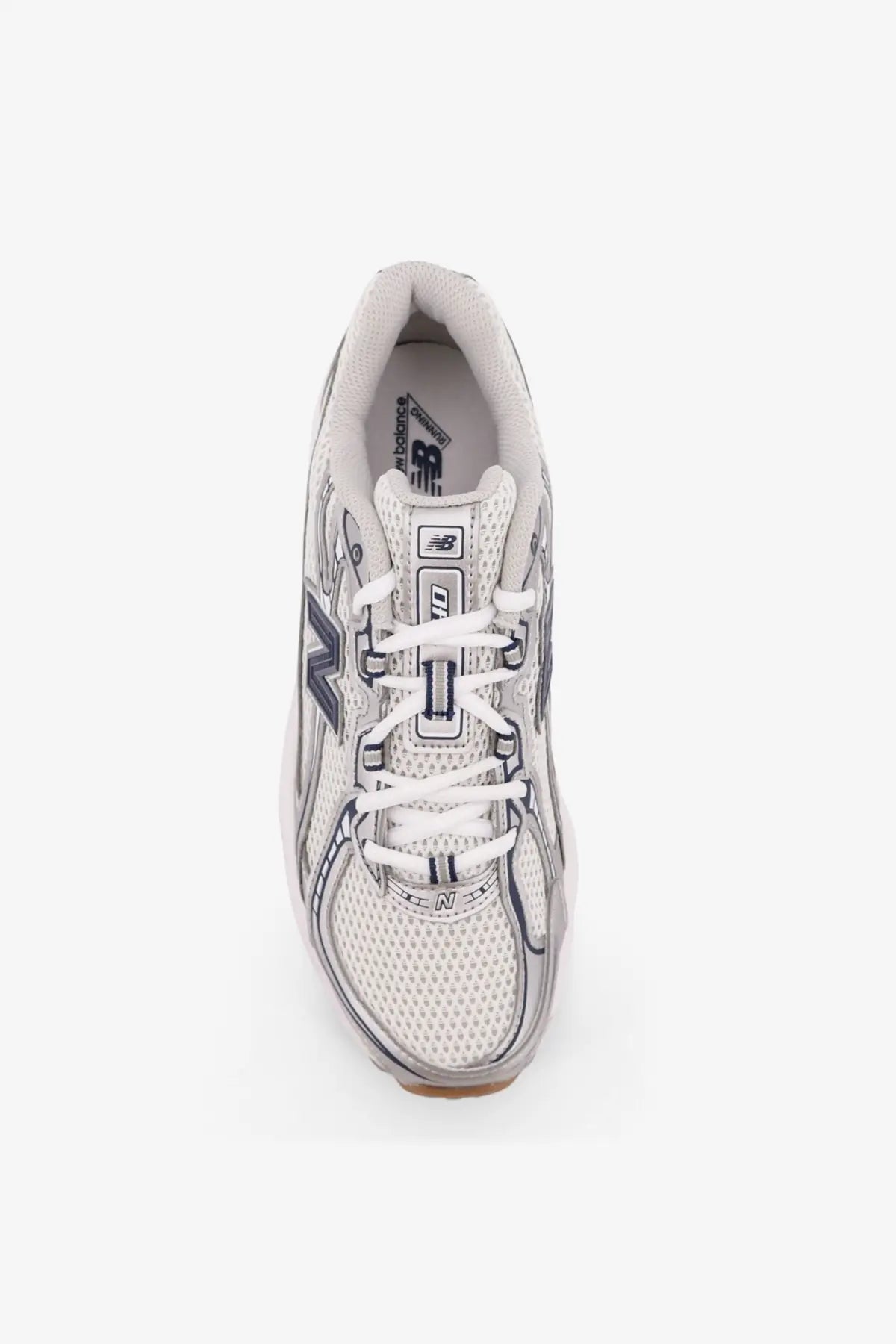 New balance men’s low top sneaker in white with mesh upper and gray accents for casual wear