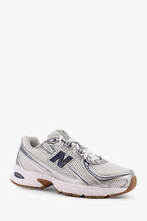 New Balance men’s mesh low top sneakers grey with white and silver mesh upper and brown rubber sole