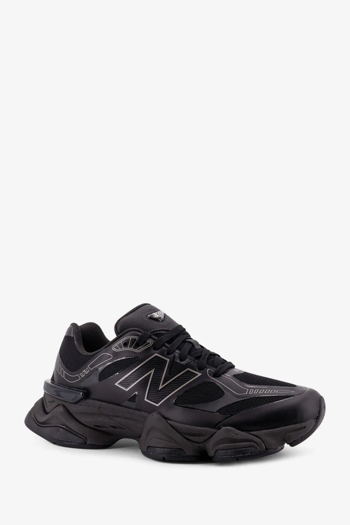 New Balance men’s mesh sneakers black with chunky textured sole and subtle silver logo detailing