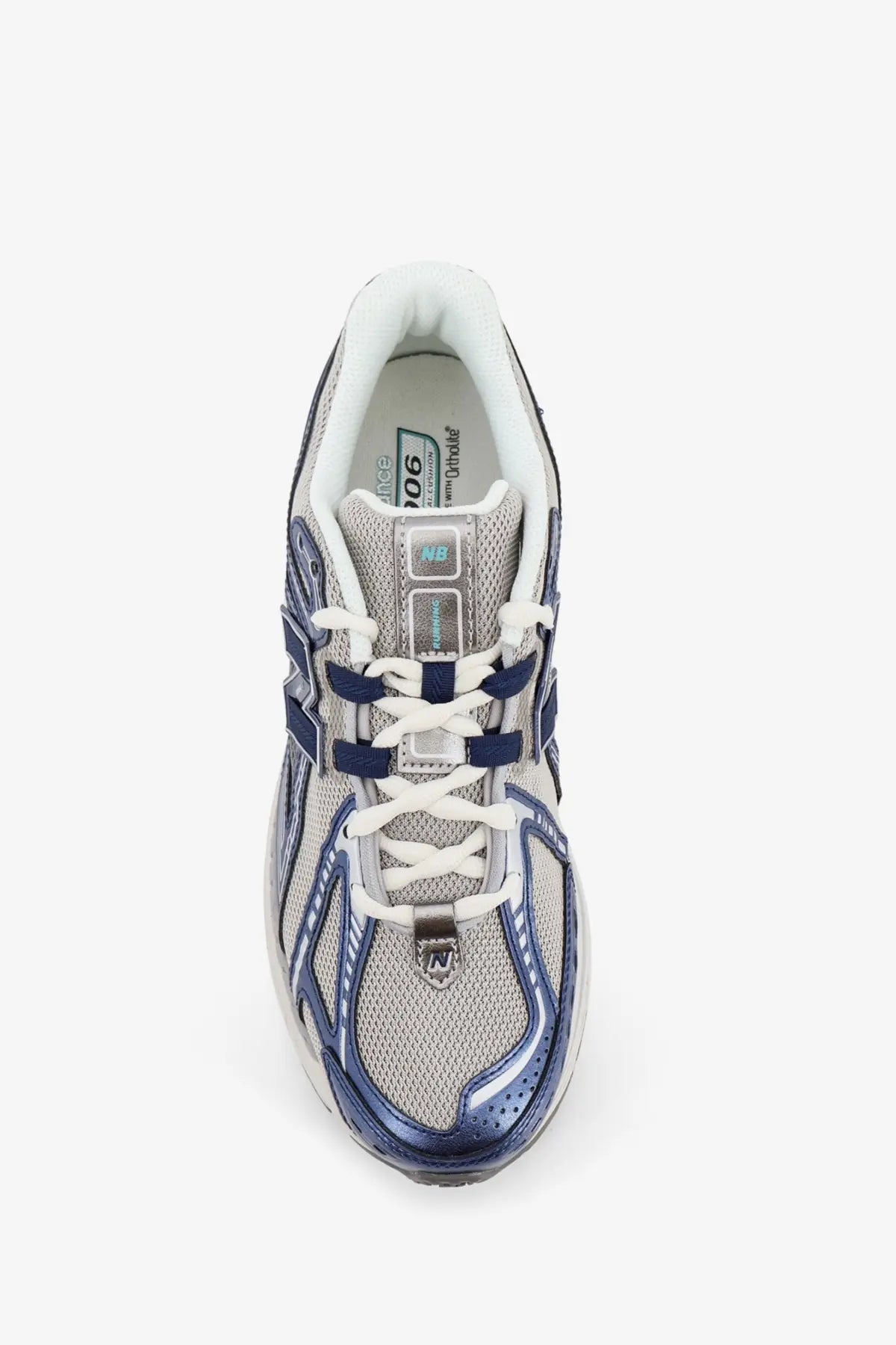 New Balance men’s mesh sneakers blue featuring gray and navy 1006 running shoe with mesh upper metallic accents and white laces