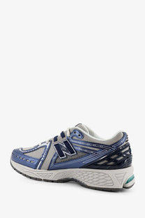 New Balance men’s mesh sneakers blue with blue and gray mesh upper synthetic overlays and white midsole